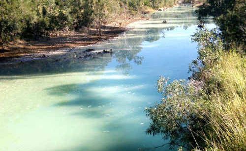 Farmer Neal Johansen says the river’s colour could be a warning of extreme pollution. This picture was taken 18km from Mt Morgan mine. Farmer Neal Johansen says the river’s colour could be a warning of extreme pollution. This picture was taken 18km from Mt Morgan mine.